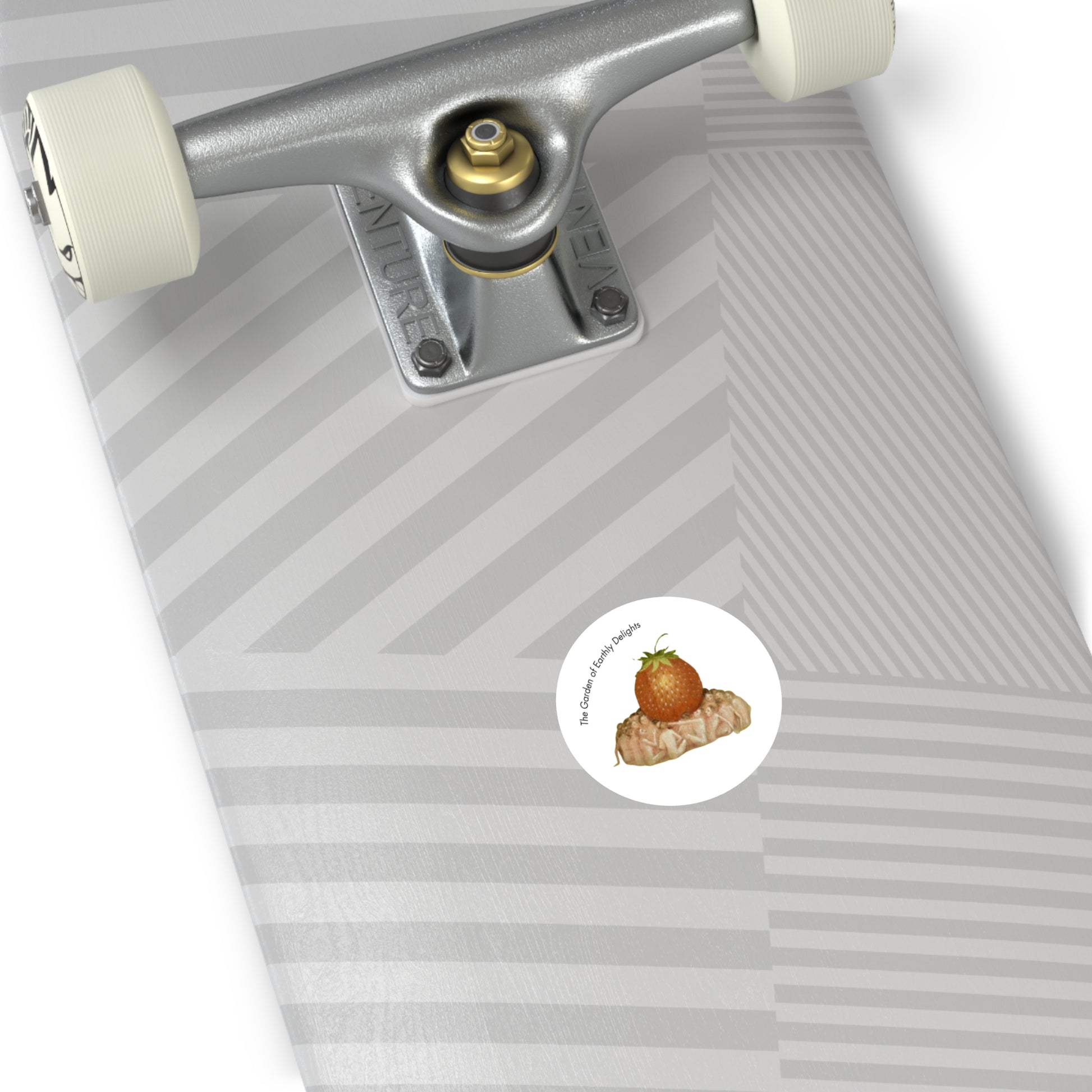 Image of round sticker on bottom of skateboard, with detail from Hieronymus Bosch's painting Garden of Earthly Delights.
