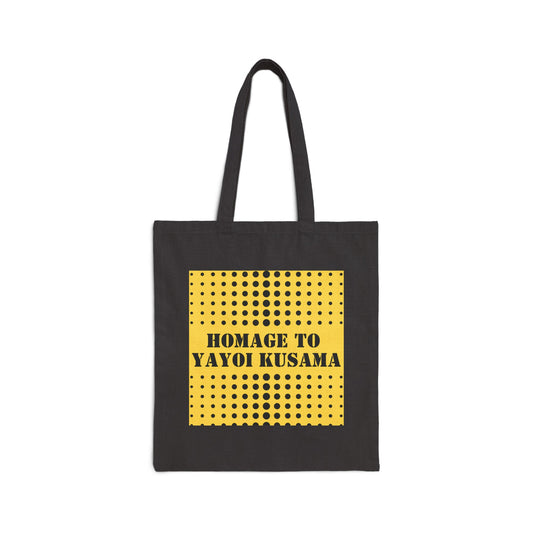 Image of black cotton canvas tote with yellow square filled with dots in rows and the words "Homage to Yayoi Kusama."
