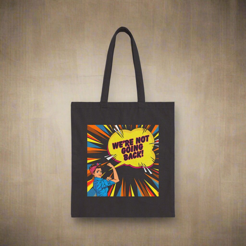 Image of black canvas tote with Pop art style image of woman saying we're not going back."
